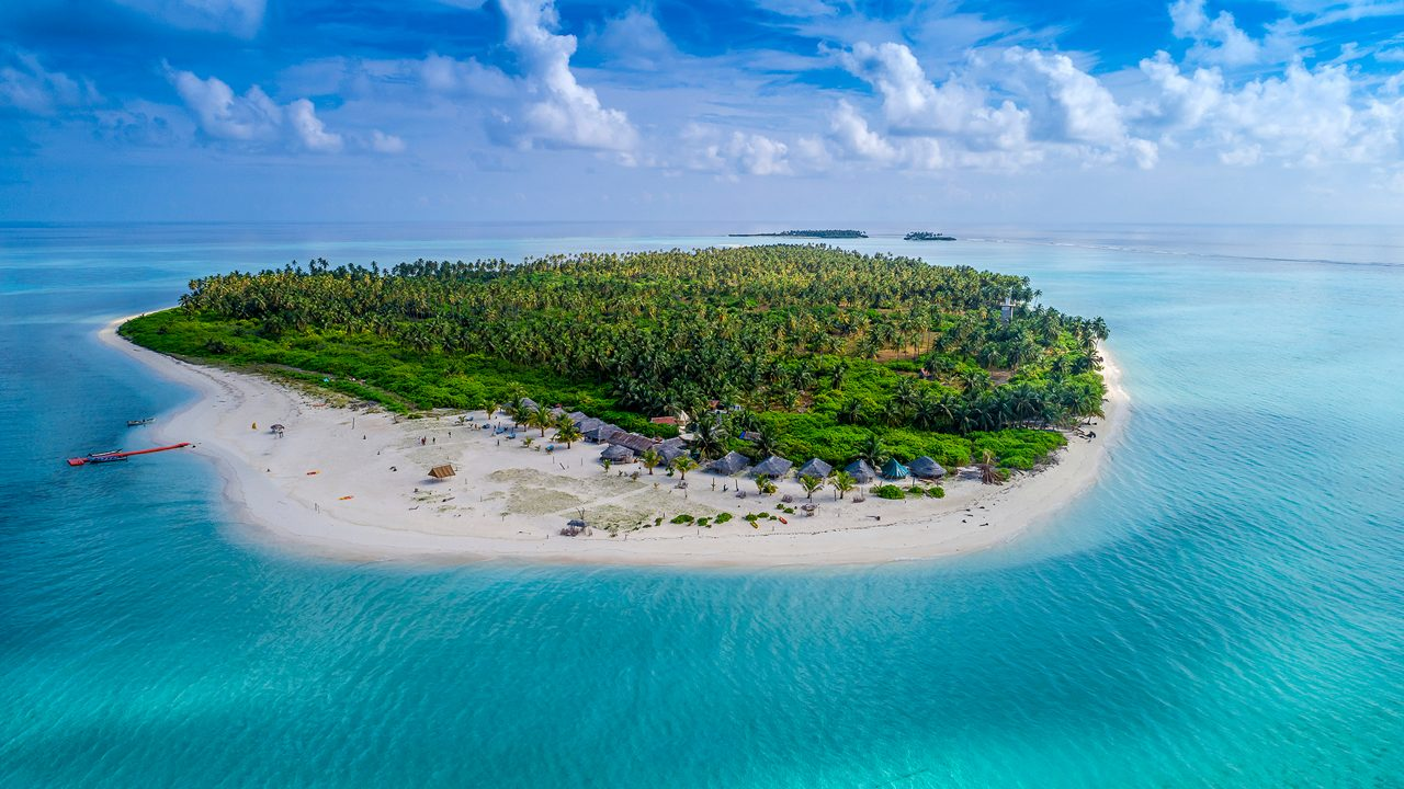 Aerial view of Kavaratti lagoon with turquoise water and white sand