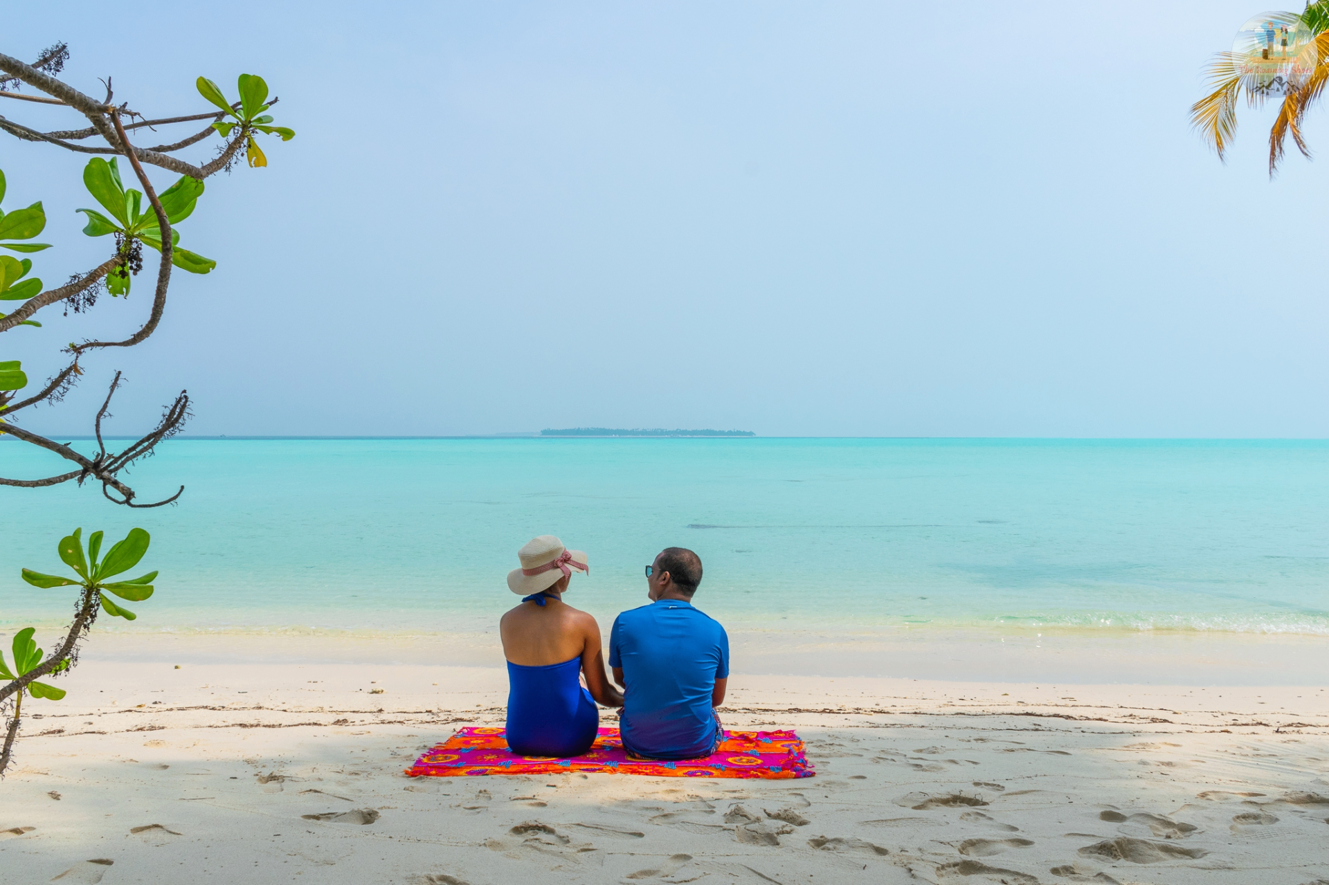 Bangaram Atoll beach cottage with hammock and turquoise lagoon at sunset